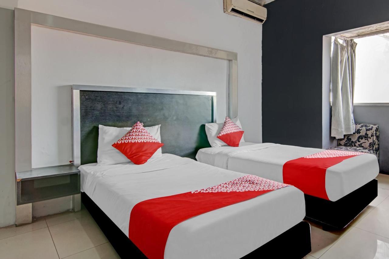 Oyo 1367 Damon Butik Hotel Pekanbaru Extérieur photo